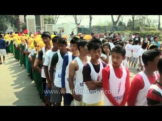 Manipuri actress Sur Bala leads the torch lighting at Kangla Fort