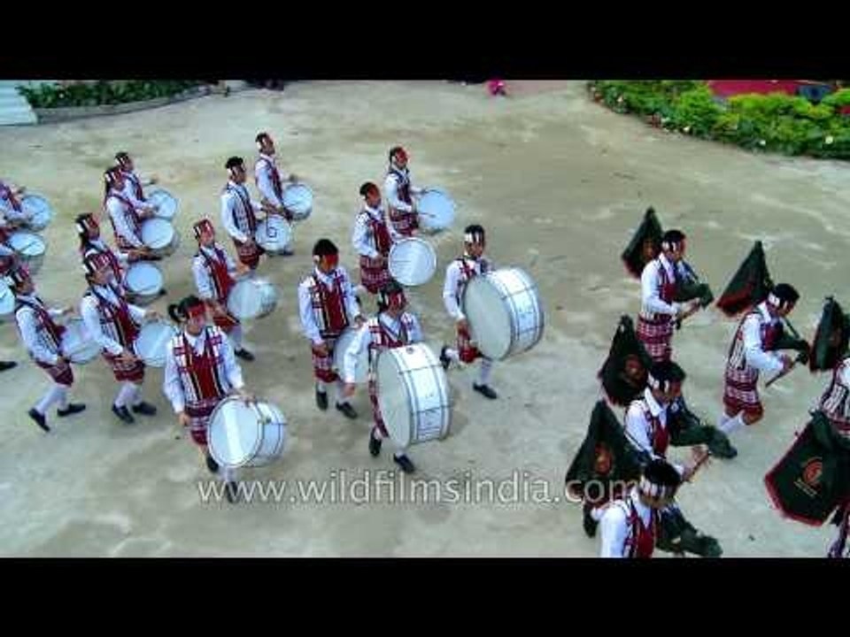 Perfect synchronization of footfalls and drum beats during a march by Mizo Pipers