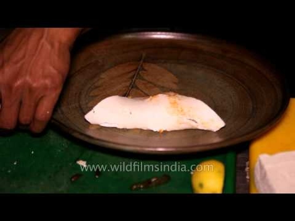 Chef plating food at Denwa Backwater Escape Lodge