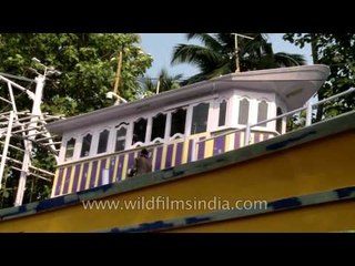 Large fishing boat being painted: Kochi