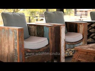 Wooden living room interior at Denwa Backwater Escape lodge