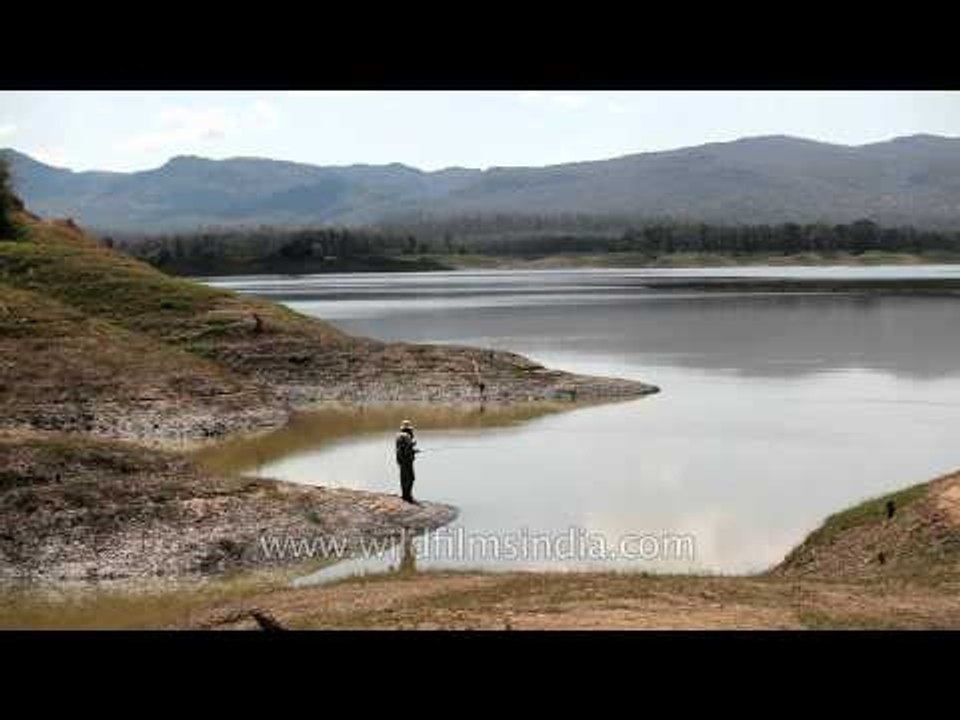 Man fishing on Denwa river in Satpura, Madhya Pradesh