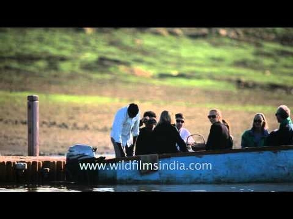 Visitors enjoying boat ride at Denwa River, Satpura
