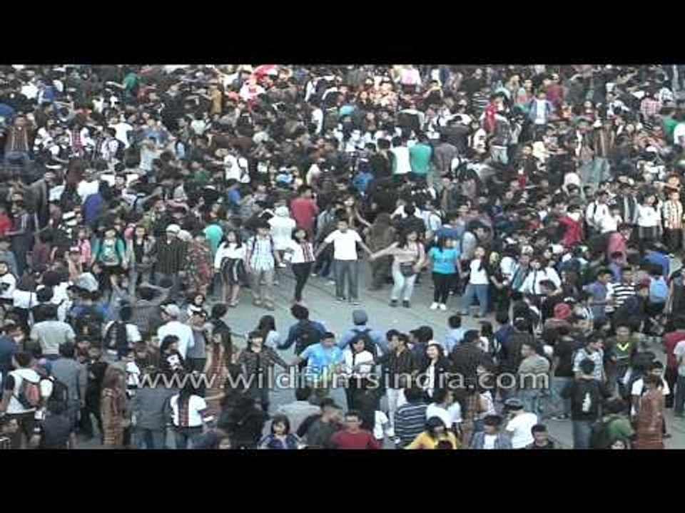 Crowd waves hand as Mizo singer performs