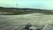 Air Asia planes line up on runway of Kuala Lumpur Airport