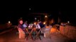 Tourists dining outside at Lodge Terrace in Kanha Earth Lodge