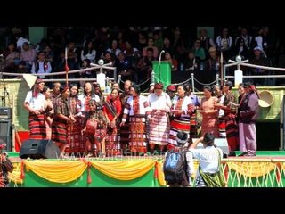 Mizo folks presenting traditional songs with the beats of gong