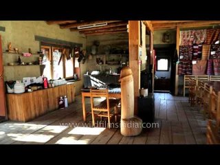 Large wooden penis for sale: Chimi Lakhang Cafeteria of Punakha valley in Bhutan