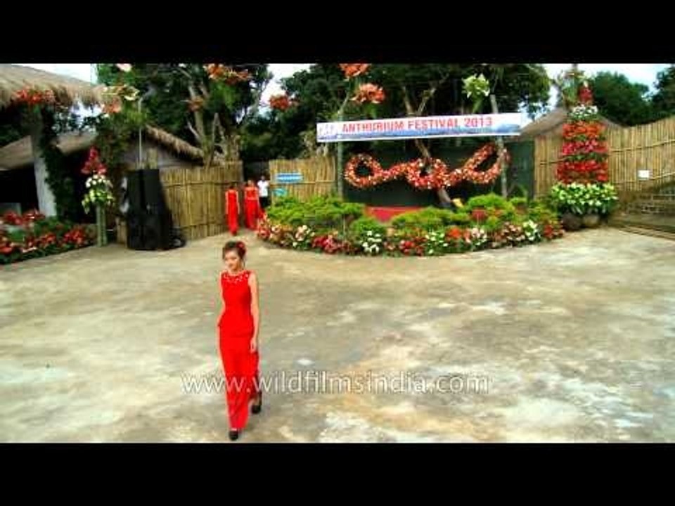 Mizo models in red displaying the collection of local designers