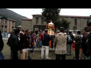 Devotees swing palanquin of the deities during Shoba Yatra - Mandi