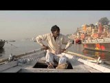 Sailor on the cruise at the sacred ghats of Varanasi