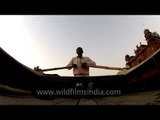 Sailing on the banks of Ganges with Chet Singh Ghat in background - Varanasi