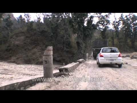 Crossing damaged roads on the way to Dehradun through Rajaji National Park