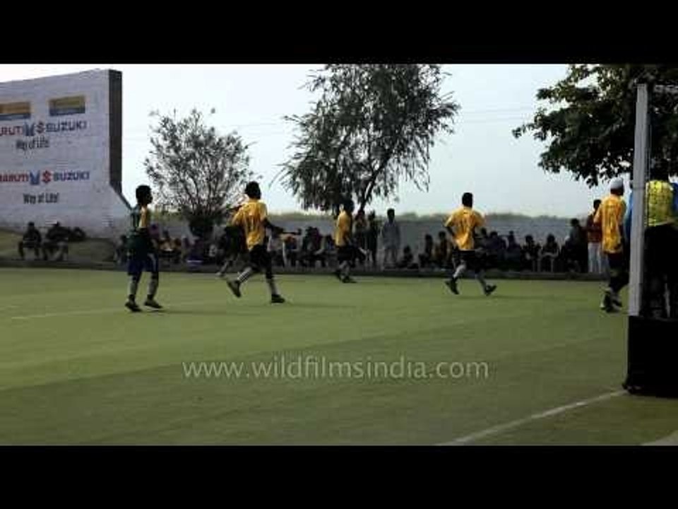 Hockey players in action at Kila Raipur Rural Olympic