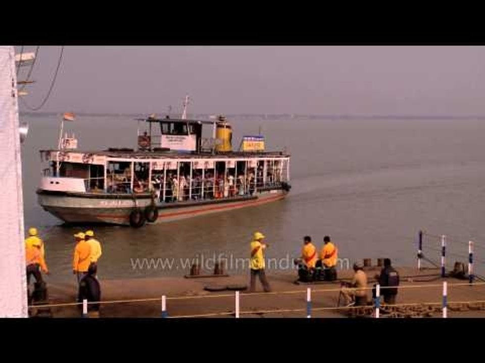 Pilgrims crossing the Hoogly on their way to Gangasagar Mela
