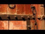 Heavy wooden door of 15th century in Neemrana Fort-Palace