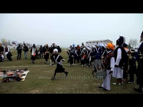 Young Nihangs demonstrating martial skills