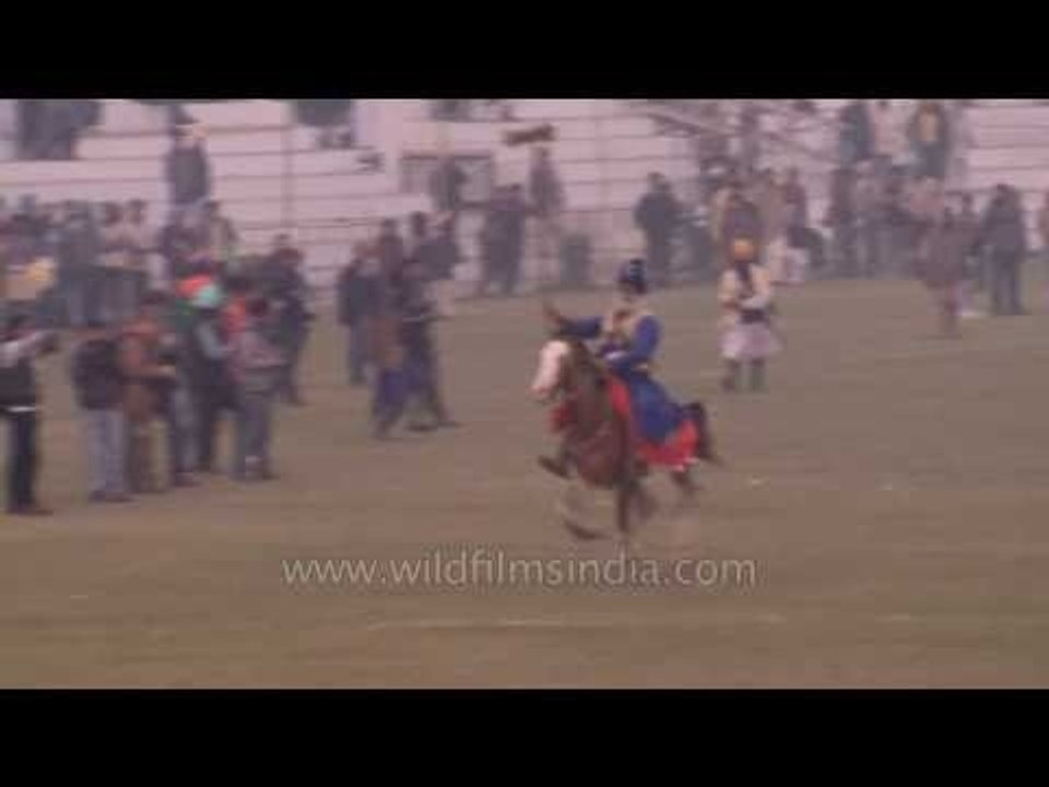 Nihang Sikh warriors horse riding - Kila Raipur, Punjab