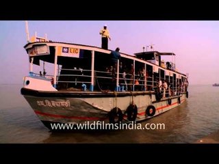 Passenger vessel sailing towards Gangasagar mela