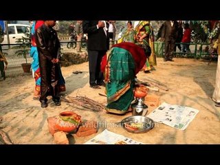 Tamil ladies start making Sakarai Pongal