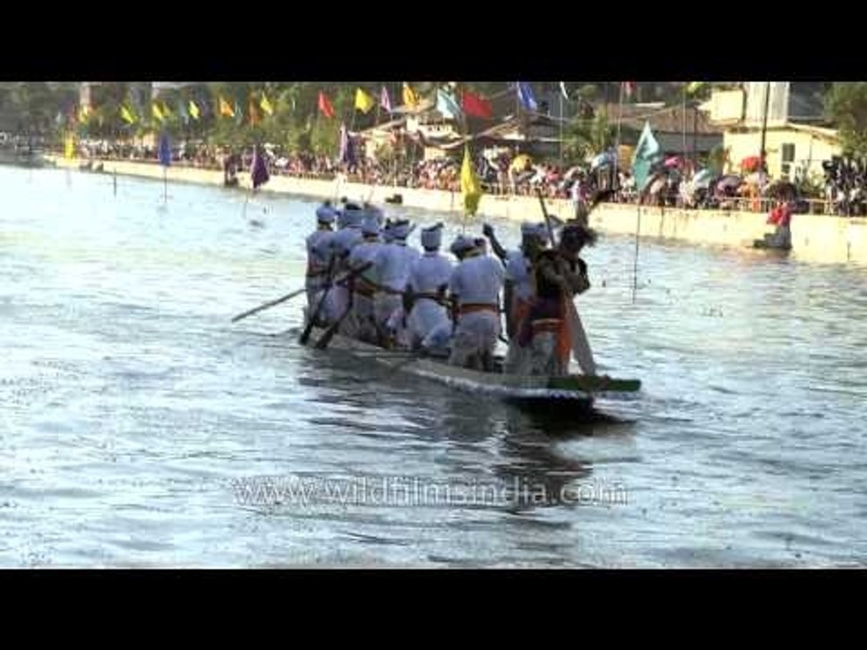 Boat race in progress at Thangapat, Imphal