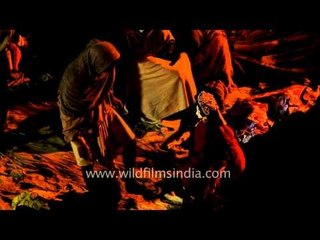 Pilgrims of Gangasagar mela settling down at night