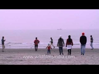 Walking down the beach on the Bay of Bengal