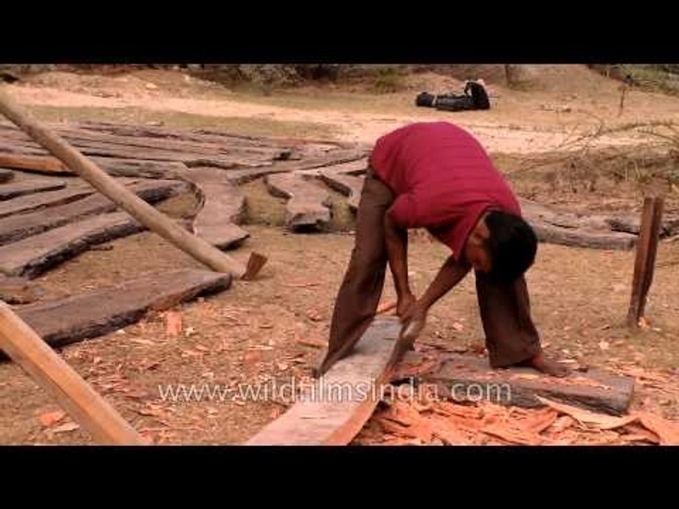 Carving with an axe a boat making process