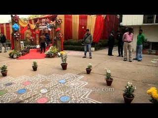 Kolan: Colourful floral patterns within white lines and curves