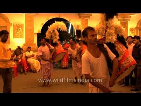 Ritual Drummers or Dhakis performing Aarati during Durga Puja