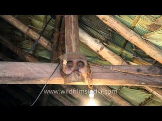 Wooden human skull decorated at Naga hut
