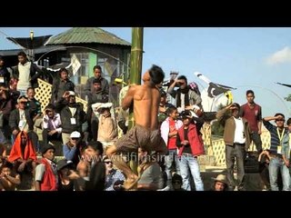Winner of greased pole climbing competition at Hornbill Fest