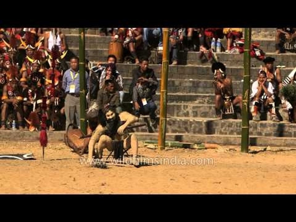Konyak tribe demonstrating the way of head-hunting