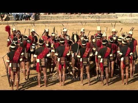 Konyak warriors beating the log drum at Kisama village