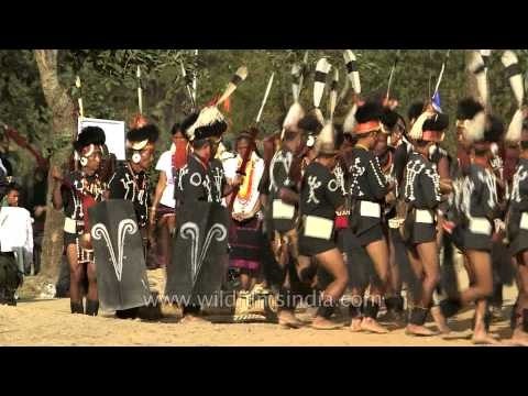 Chang Naga pulling the log drum at the Hornbill Fest