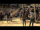 Naga boy tooples down after kicking the meat hard at meat-kicking competition