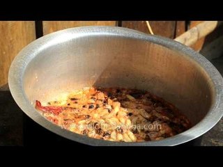 Honey bees and bee larvae cooked in Zeliang style
