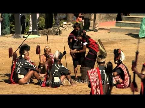 Chang tribal men enjoying a feast at Naga Heritage village