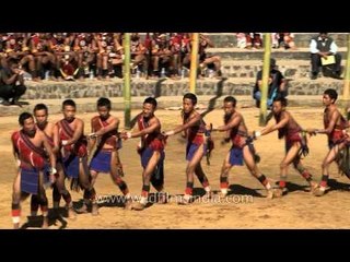 Follow-the-leader tribal performance by Lotha youth at Hornbill Fest