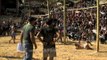 Naga boy kicks hard and falls back on his head at meat-kicking competition