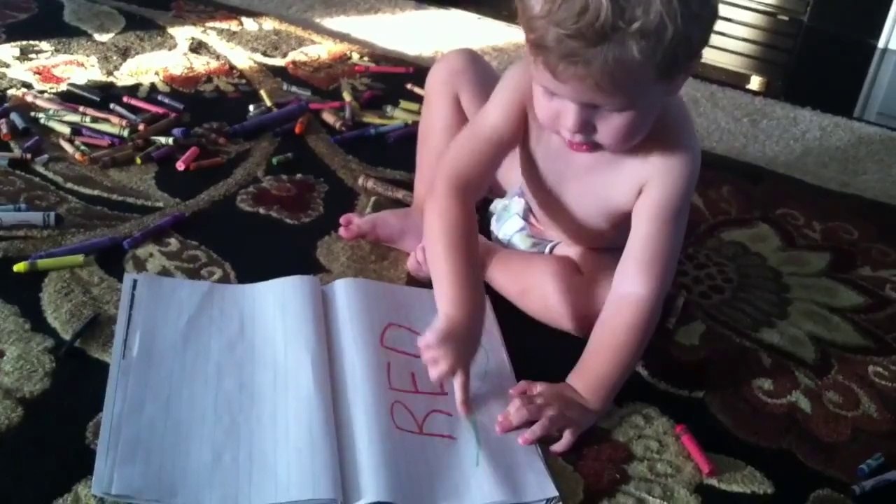 Baby boy reads "RED"