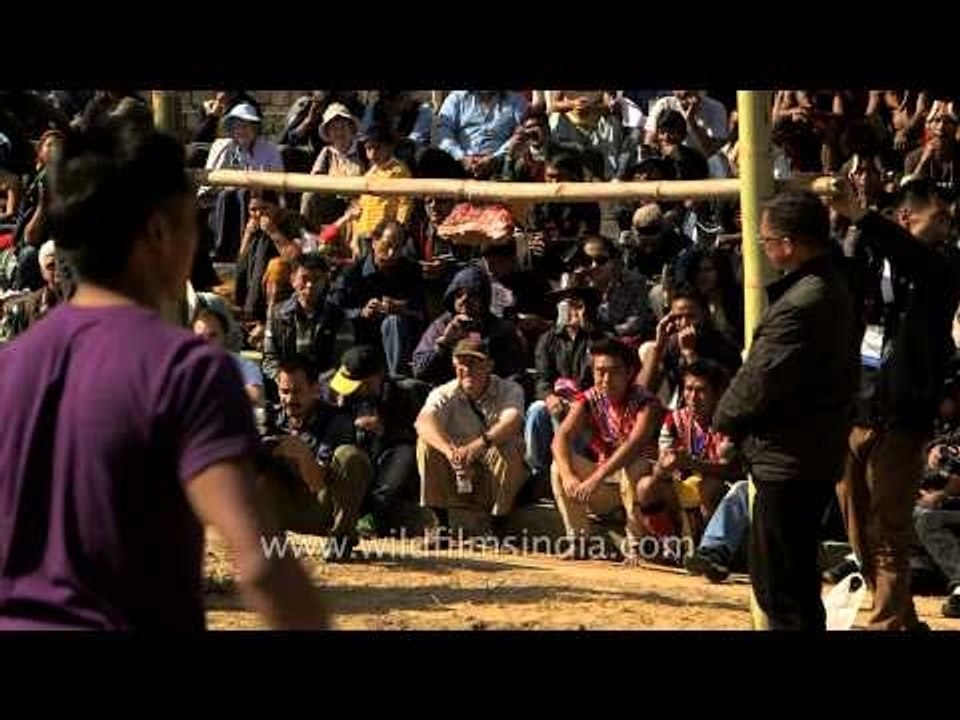 Five and a half foot bamboo bar meat-kicking competition in Nagaland