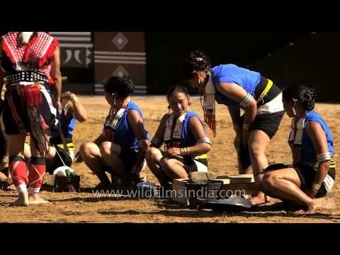 Rengma folks singing while spinning cotton