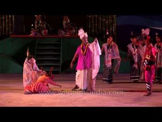 Coreographed perfomance on hunter chasing Sangai deer
