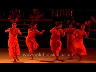 Perfomers impersonating Sangai, the brow-antlered deer of Manipur