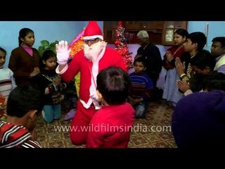 Santa prays for the children on Christmas
