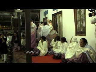 Bride taken into the groom's house by mother-in-law