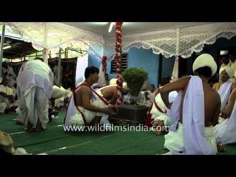Drummers and singers performing at a Manipuri wedding