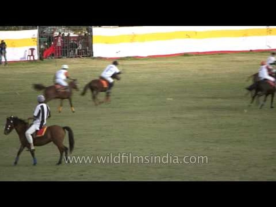 Passing the ball during 7th Manipur Polo International Match at Mapal Kangjeibung