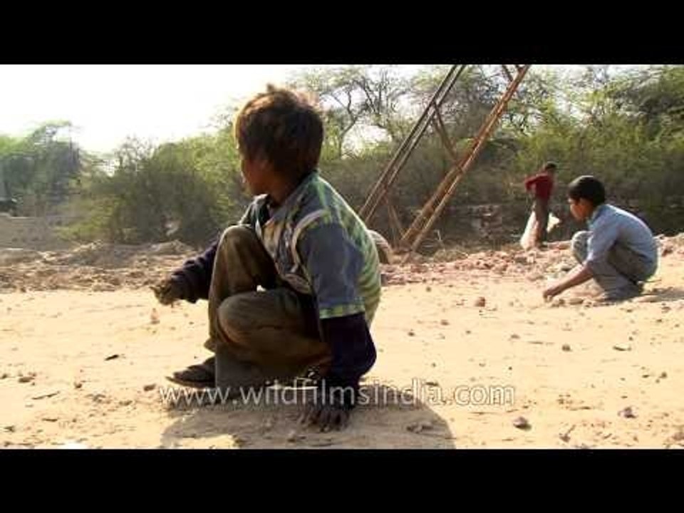 Rag pickers around construction site